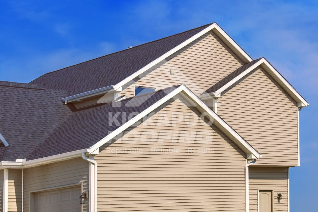 Beige siding with a brown roof