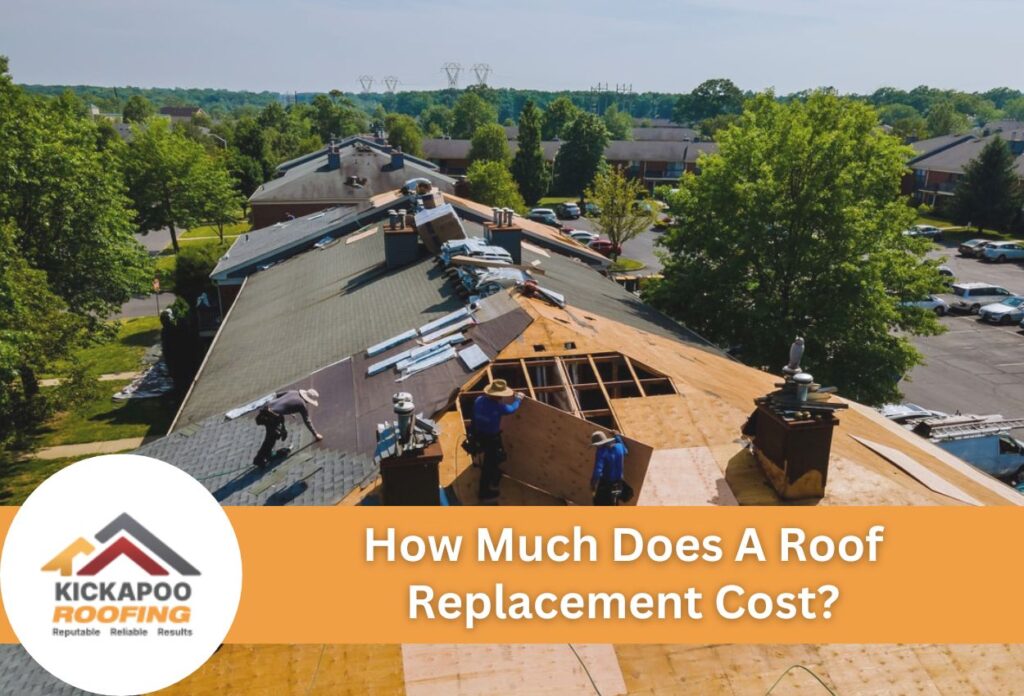 Roof replacement in progress, workers installing new shingles on a large roof.